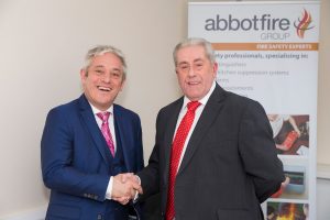 John Bercow shaking hands with Abbot Fire Group's Nigel Walton